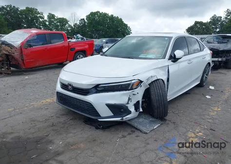 2024 Honda Civic Touring from USA, damaged, VIN 2HGFE1F94RH332914